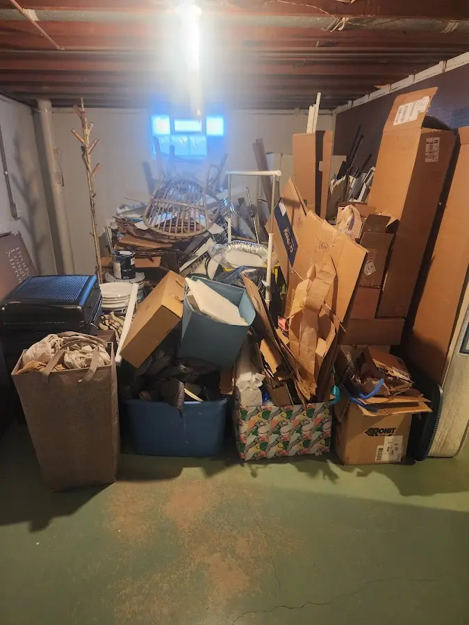 Roll-off dumpster container at job site for Concrete Dumpster Rental in New Hanover